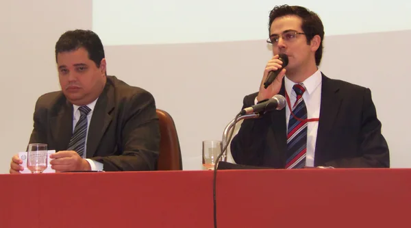Murilo Andrade de Oliveira e Helil Bruzadelli durante o evento