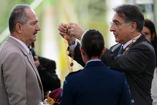 O orador oficial, ministro da Defesa, Aldo Rebelo, recebeu do governador Pimentel o Grande Colar