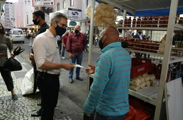 Caminhada de conscientização pelo uso de máscaras de proteção contra covid-19