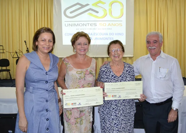 Vice-reitora Maria Ivete, maestrina Clarice Sarmento, escritora Yvonne Silveira e reitor João Canela