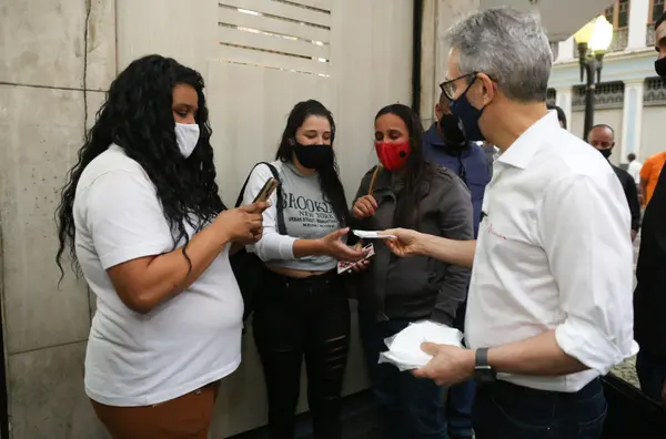 Caminhada de conscientização pelo uso de máscaras de proteção contra covid-19